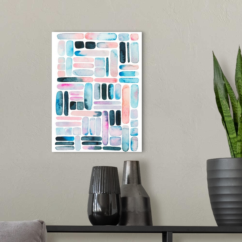 A modern room featuring Vertical watercolor painting of varies rounded square and rectangle shapes in a grid design.