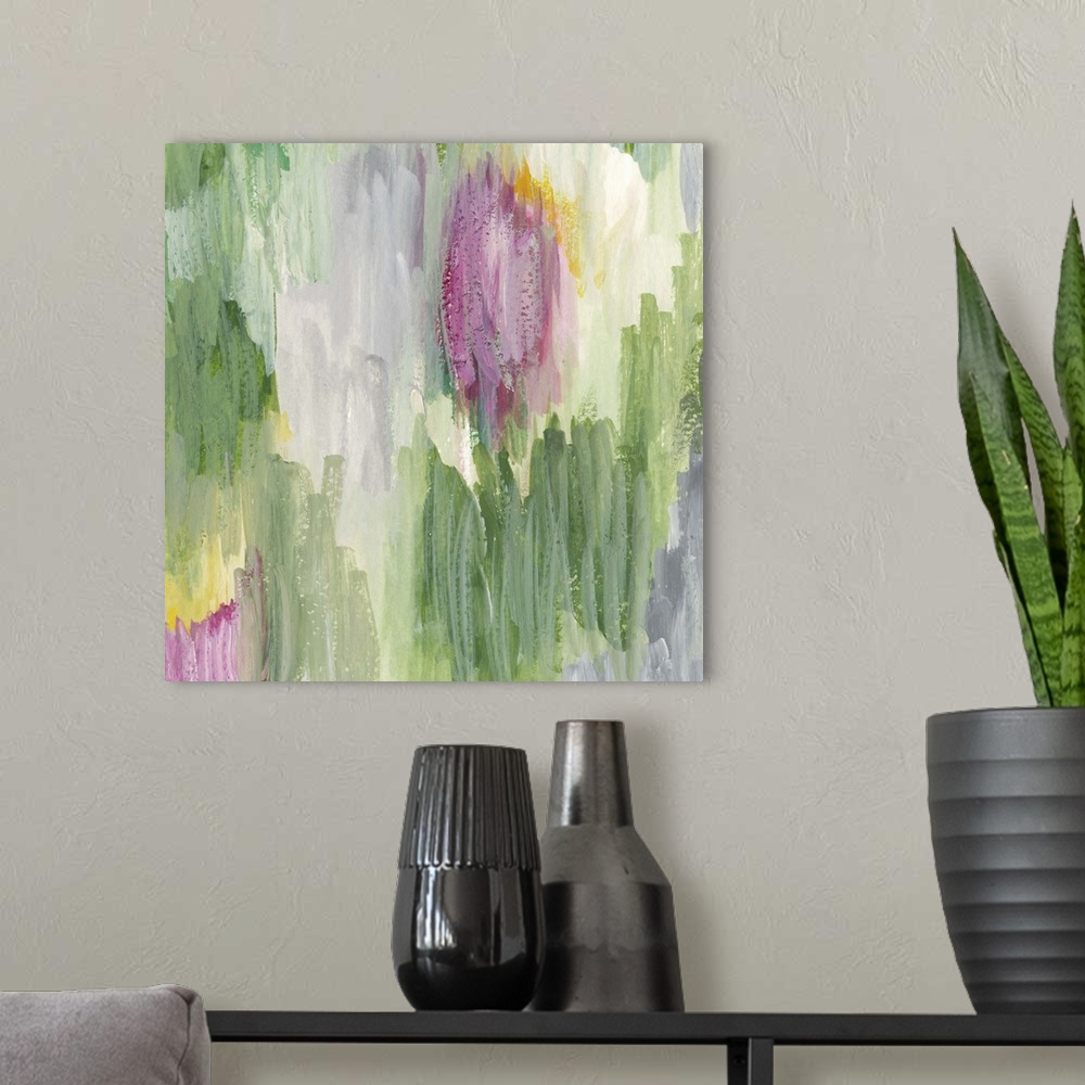 A modern room featuring Colorful contemporary abstract painting using pink and green.