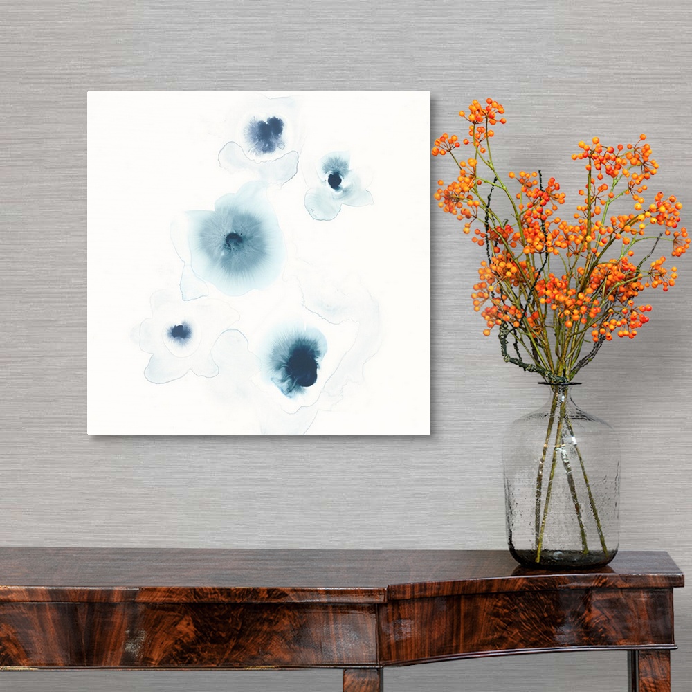 A traditional room featuring Minimalist abstract artwork of blue watercolor spots on white.