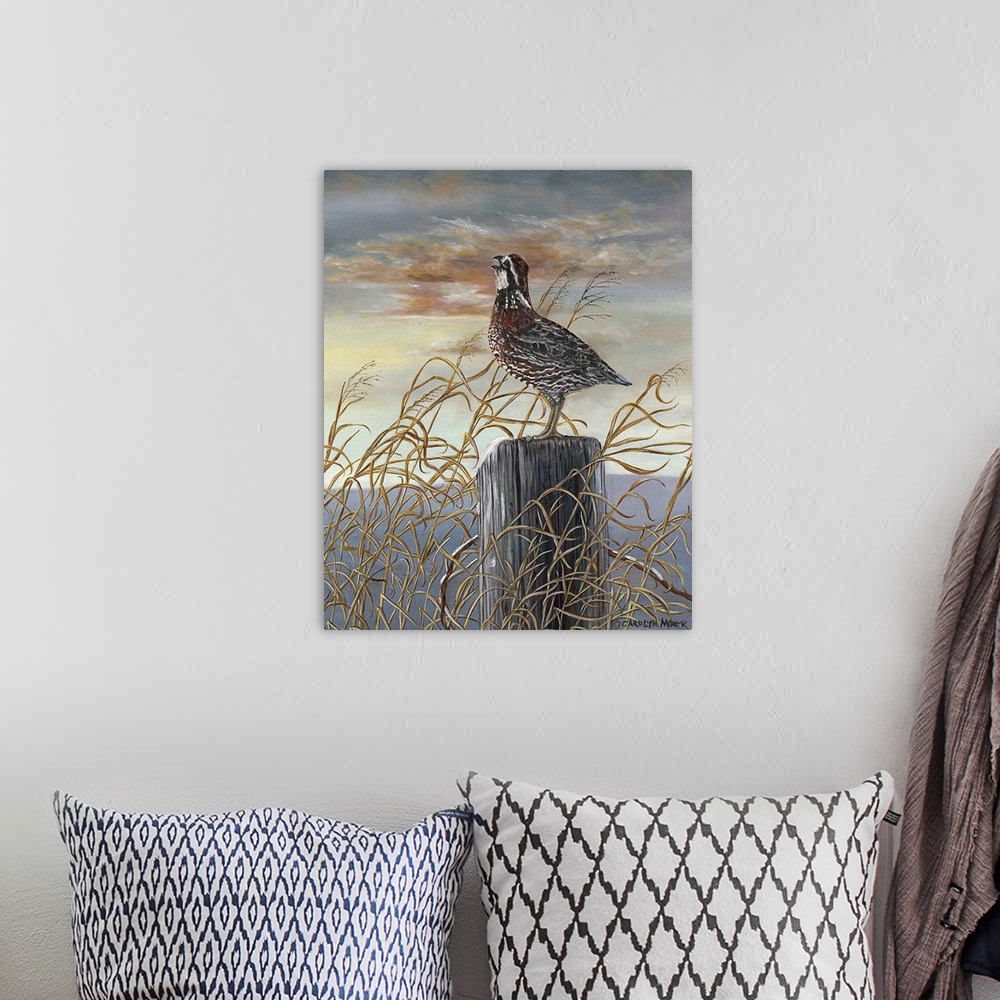 A bohemian room featuring Contemporary painting of a quail standing on a wooden post under a sunset sky.