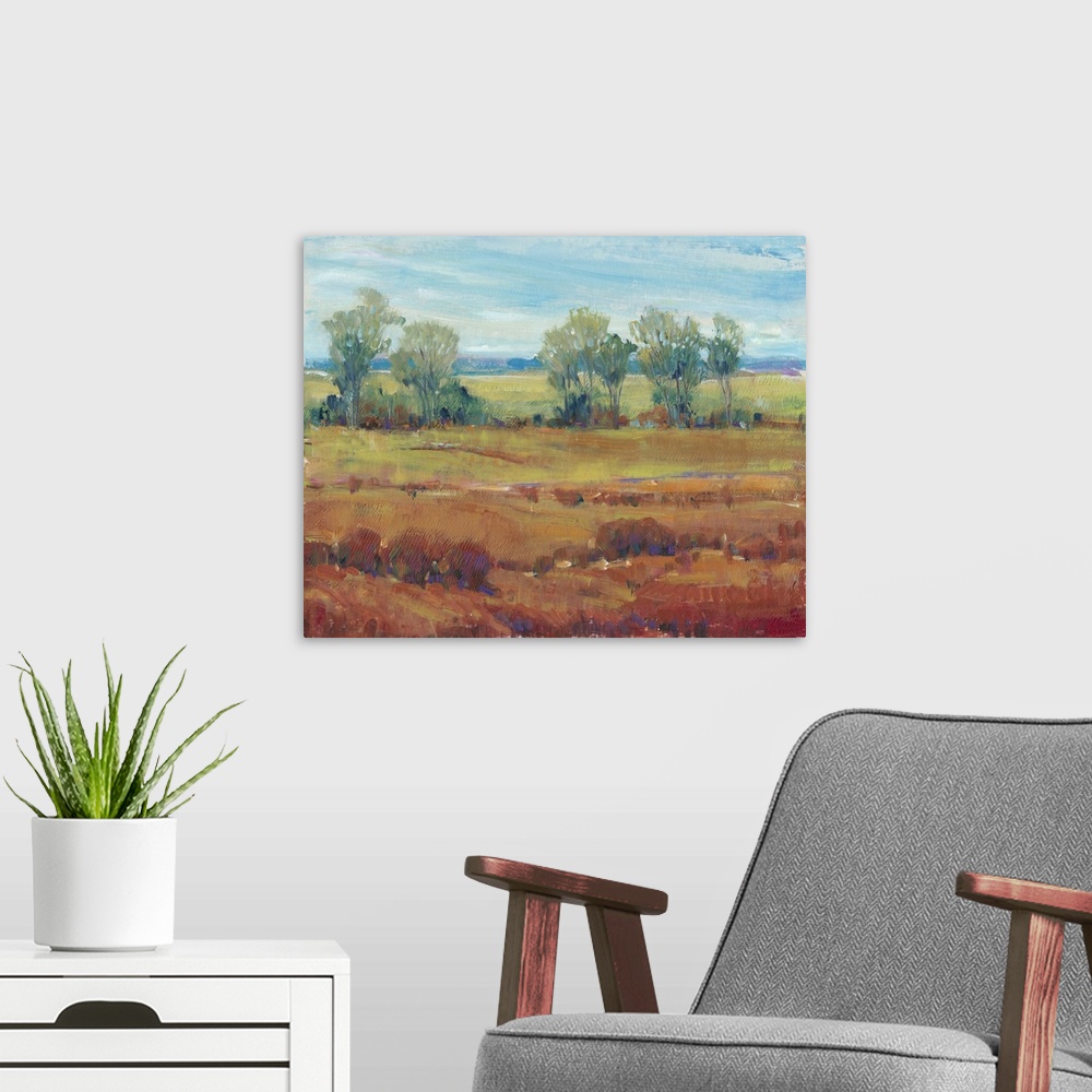A modern room featuring Contemporary painting of a landscape featuring a field of red clay in the foreground with a line ...