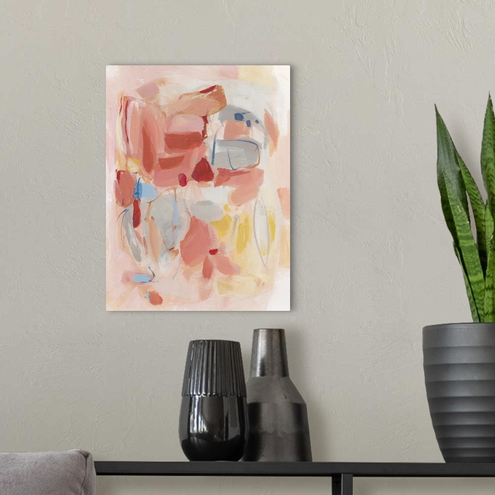 A modern room featuring Contemporary abstract art using soft pale colors mixing together to create depth.