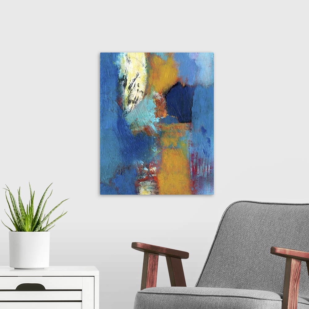 A modern room featuring Abstract contemporary artwork in deep blue with contrasting amber and red.