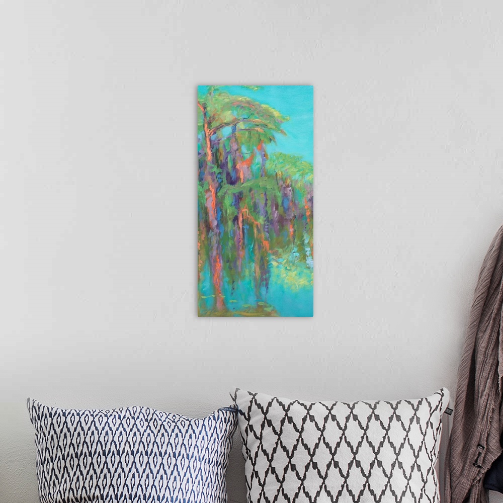 A bohemian room featuring Contemporary artwork of tropical palm trees lining the water.