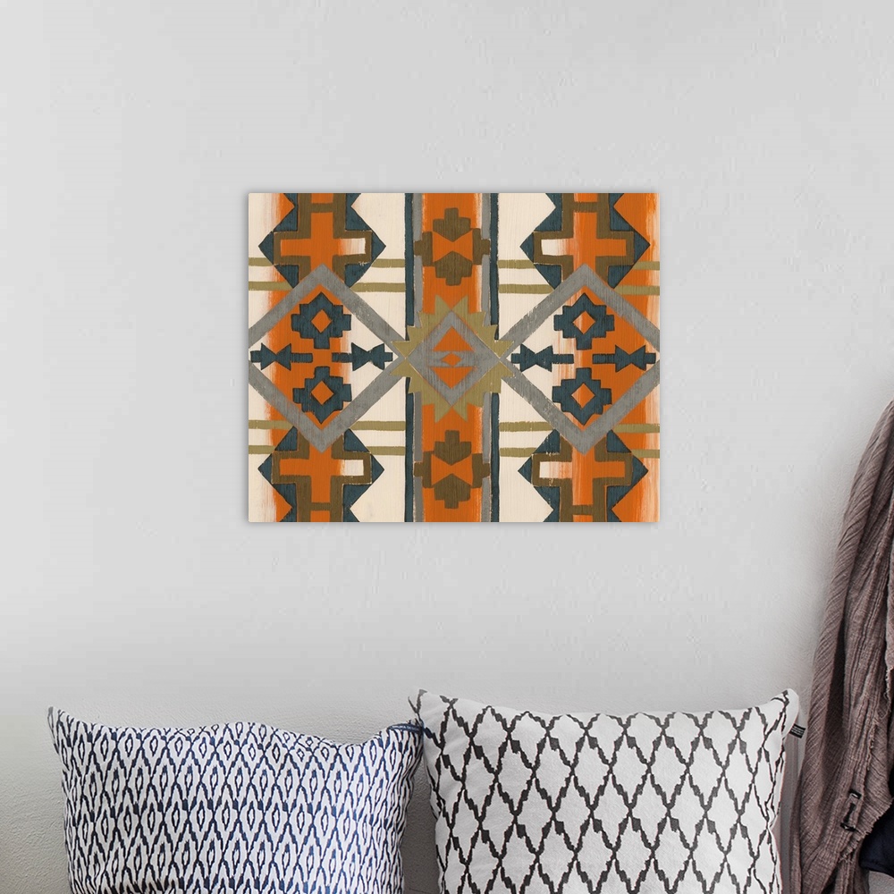 A bohemian room featuring Contemporary pattern artwork using southwestern designs.