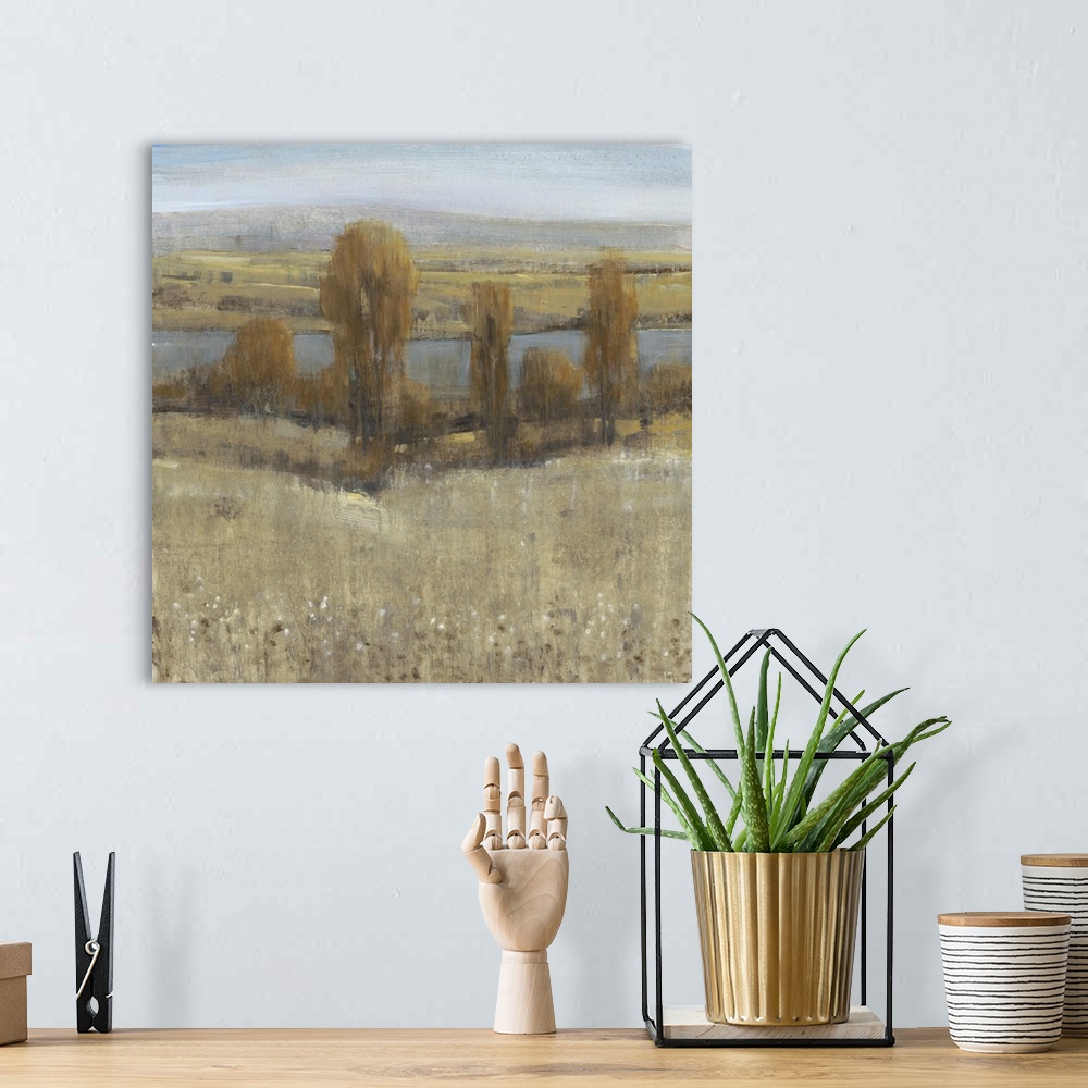 A bohemian room featuring Contemporary art print of a river running through a valley in the fall.