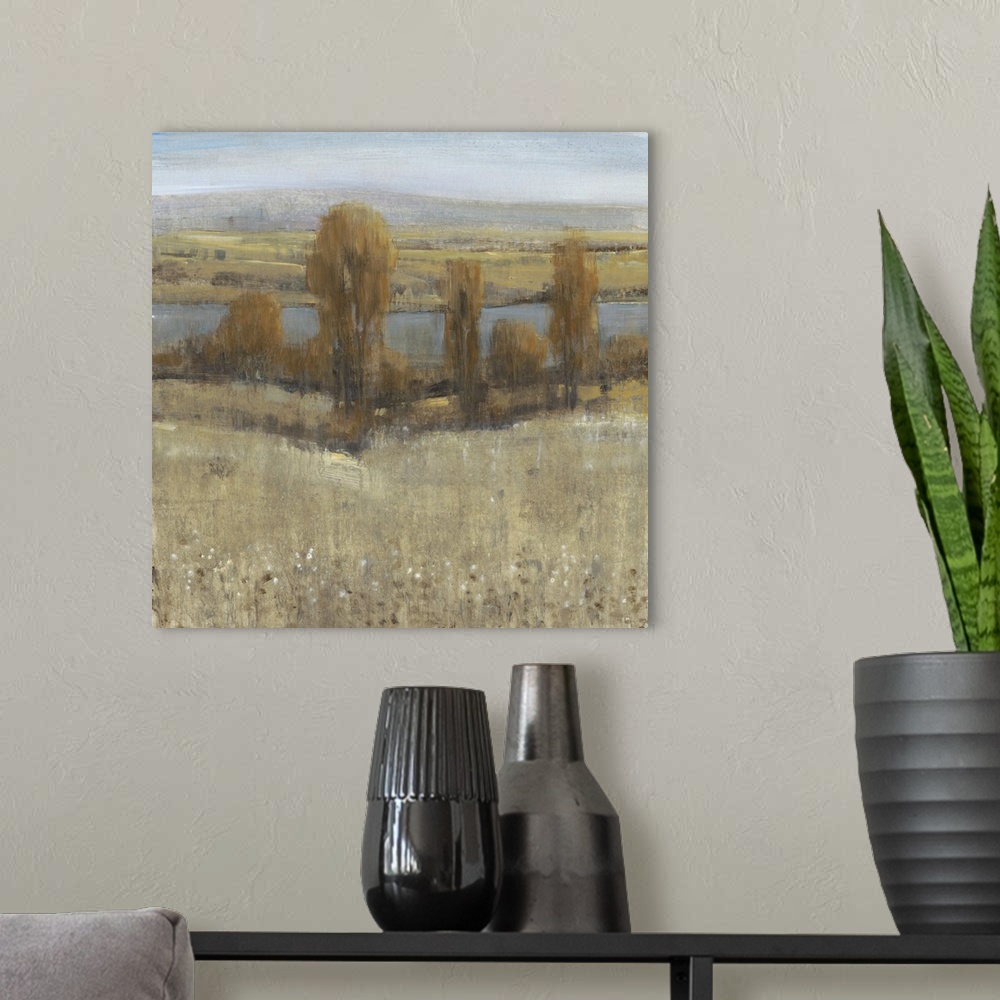 A modern room featuring Contemporary art print of a river running through a valley in the fall.