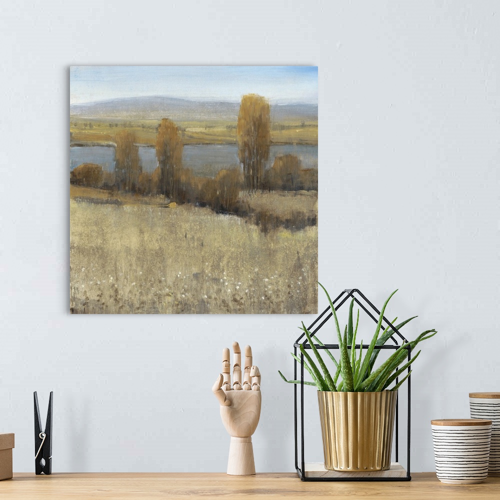 A bohemian room featuring Contemporary art print of a river running through a valley in the fall.