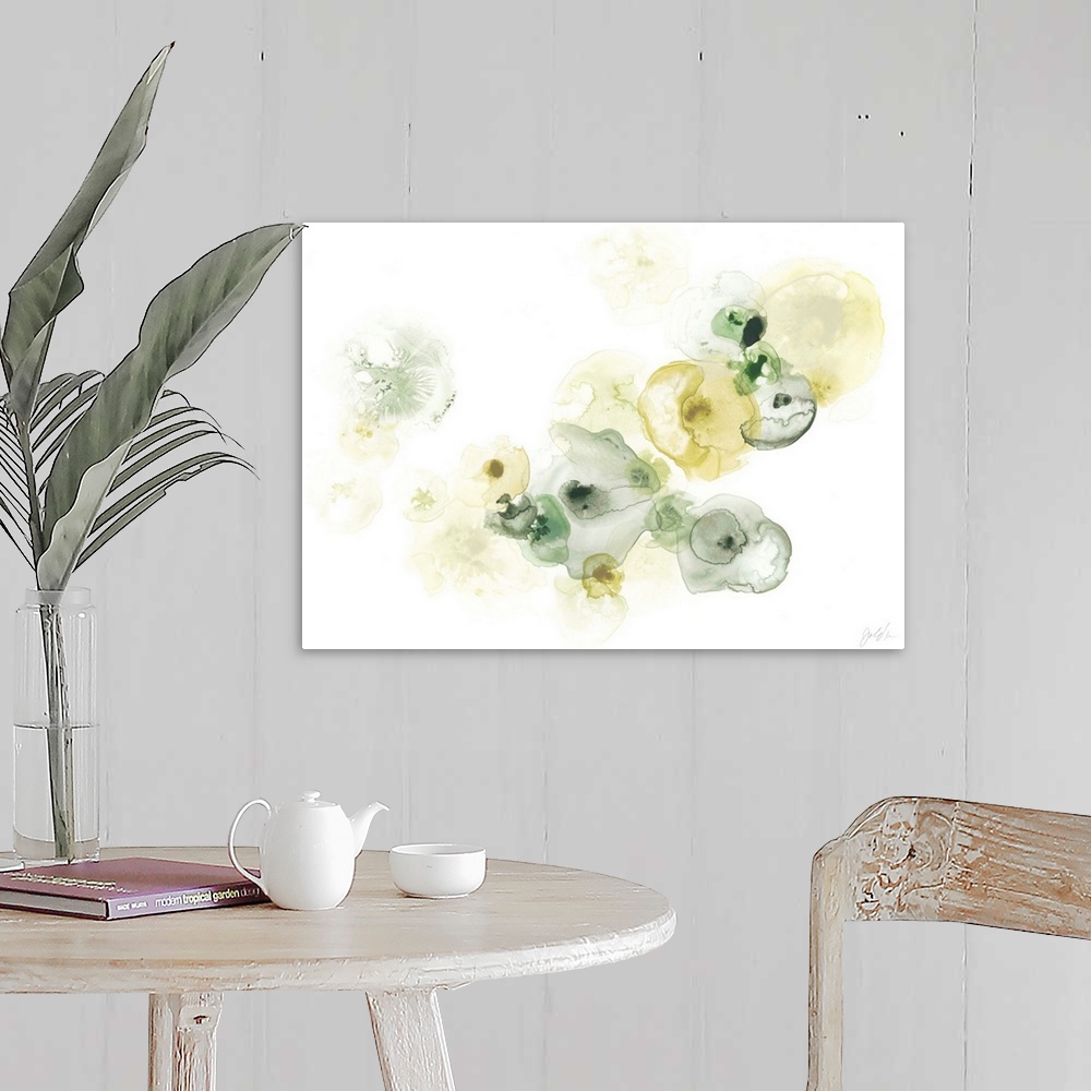 A farmhouse room featuring This decorative art features green and yellow watercolor droplets to form lichen like shapes on a...