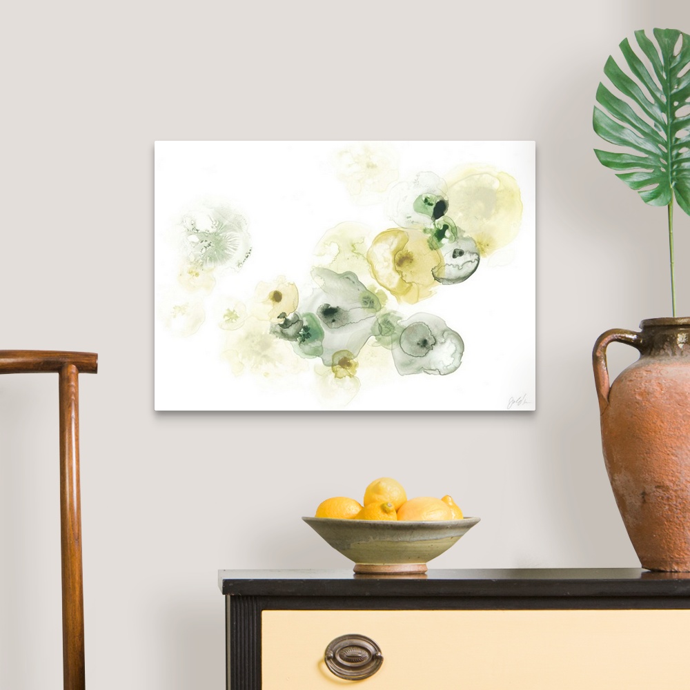 A traditional room featuring This decorative art features green and yellow watercolor droplets to form lichen like shapes on a...