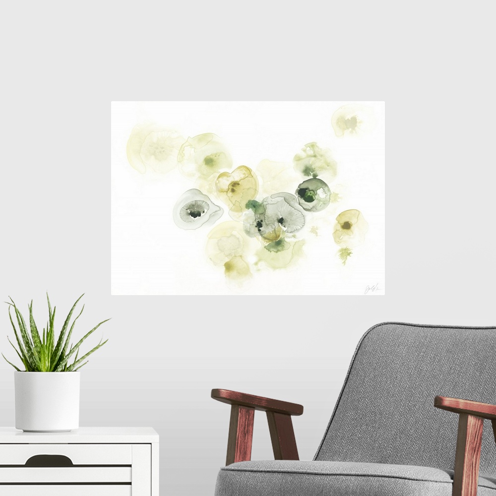 A modern room featuring This decorative art features green and yellow watercolor droplets to form lichen like shapes on a...