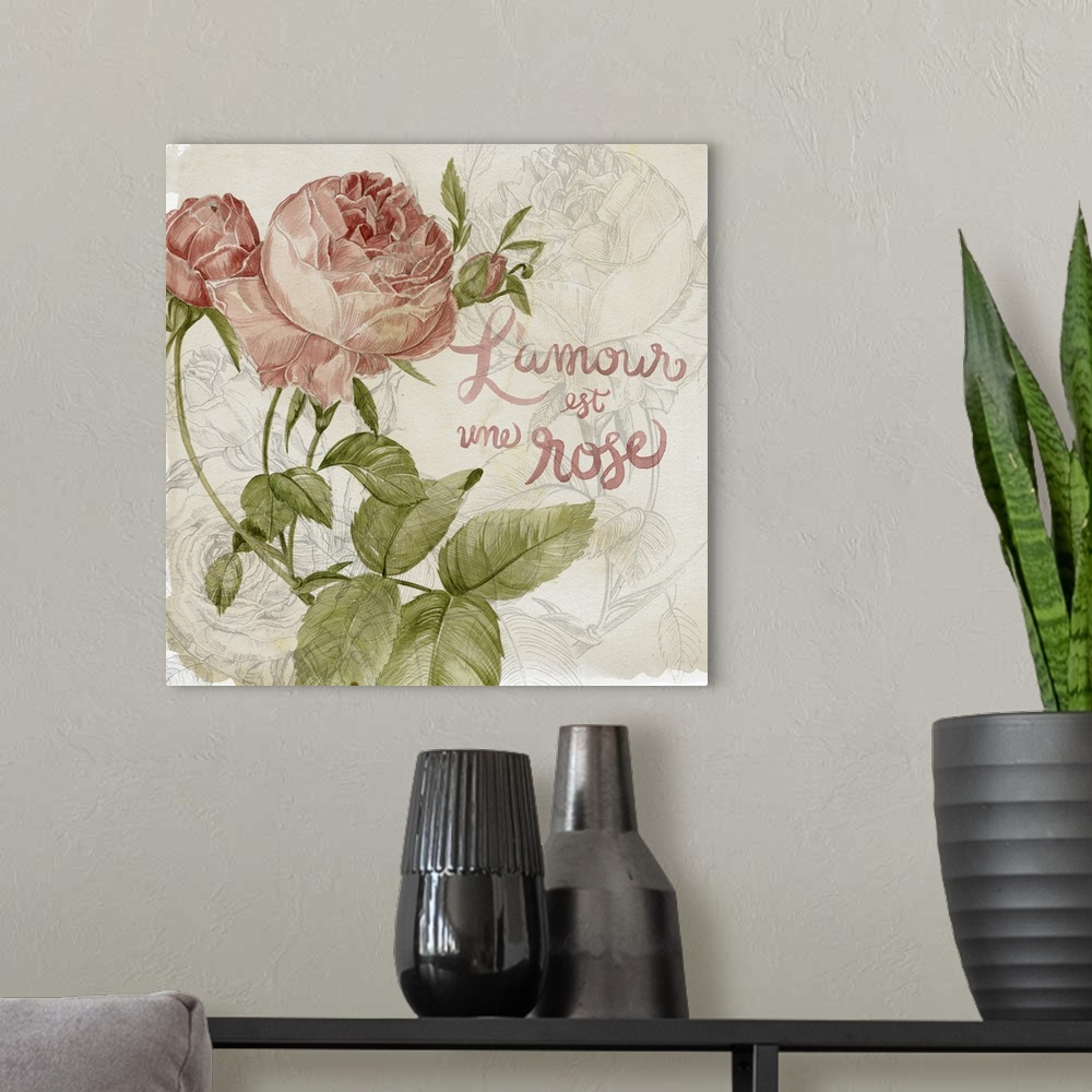 A modern room featuring Decorative artwork of illustrated colored roses over rose line art with the words, "L'amour est u...