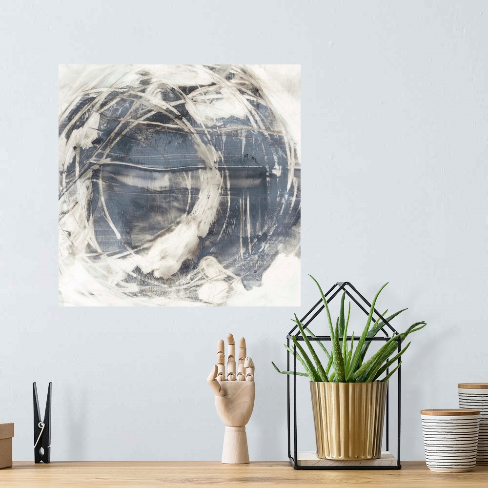 A bohemian room featuring An organic, rounded abstract painting that resembles the earth surrounded by swirling clouds.