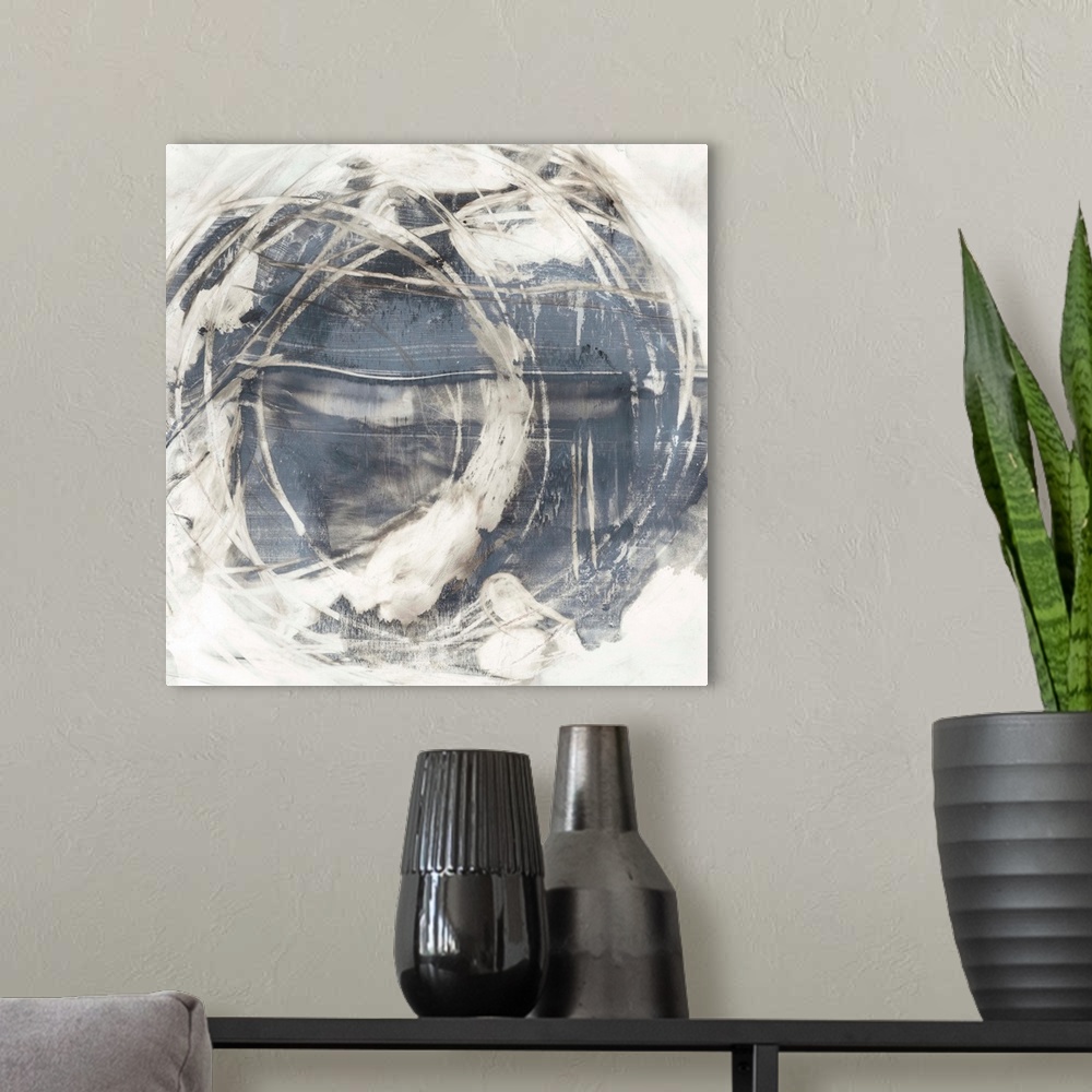 A modern room featuring An organic, rounded abstract painting that resembles the earth surrounded by swirling clouds.