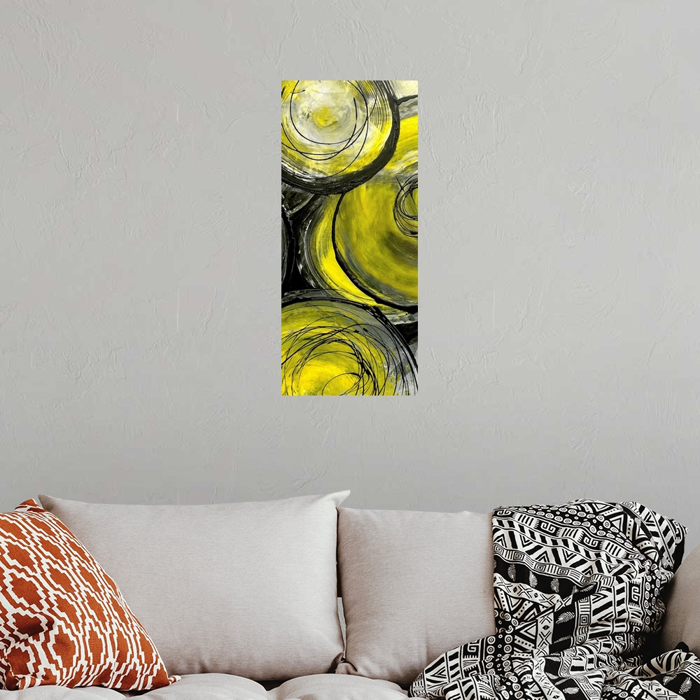 A bohemian room featuring Giant, vertical contemporary painting of overlapping,  golden circles painted with a mixture of g...