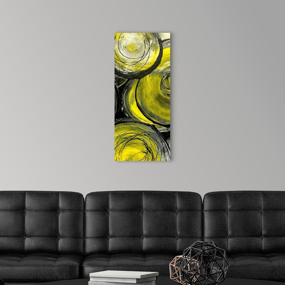 A modern room featuring Giant, vertical contemporary painting of overlapping,  golden circles painted with a mixture of g...