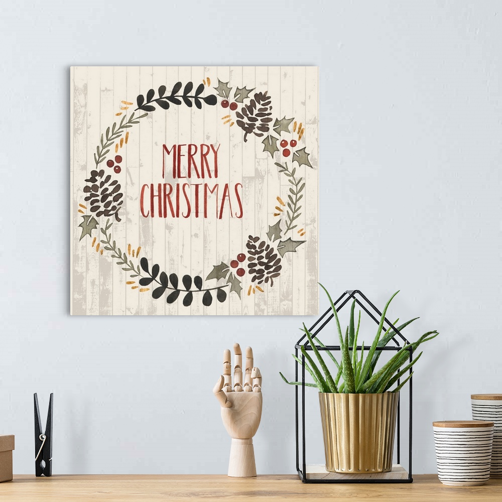 A bohemian room featuring Folk art style Christmas wreath encircling the words "Merry Christmas" with holly berries, leaves...