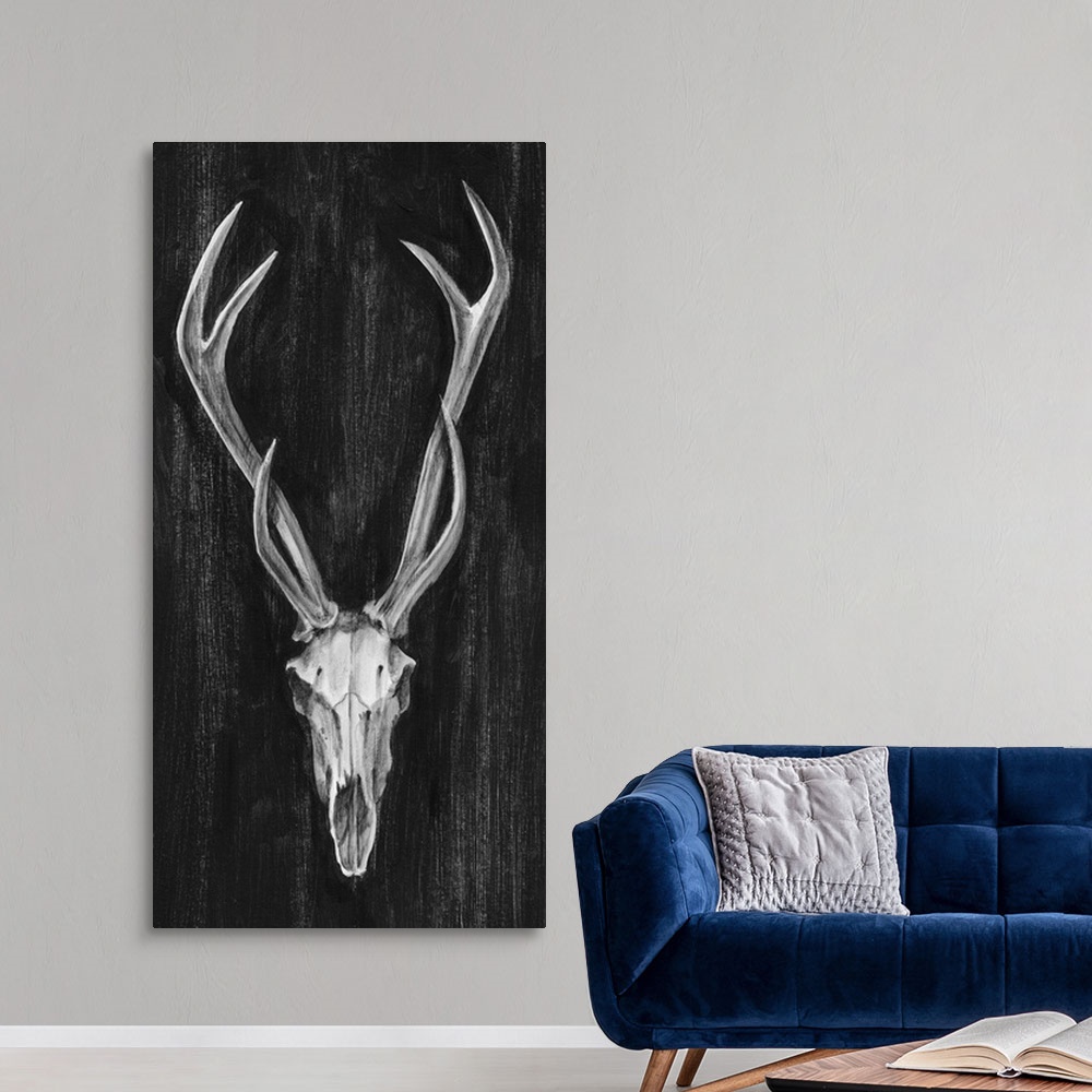 A modern room featuring Contemporary artwork of an antelope skull with large horns.