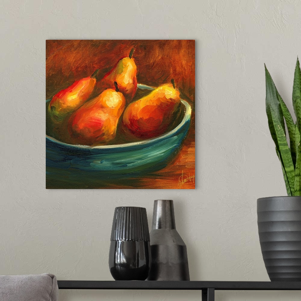 A modern room featuring Docor perfect for the kitchen that is a painted bowl full of pear fruit.