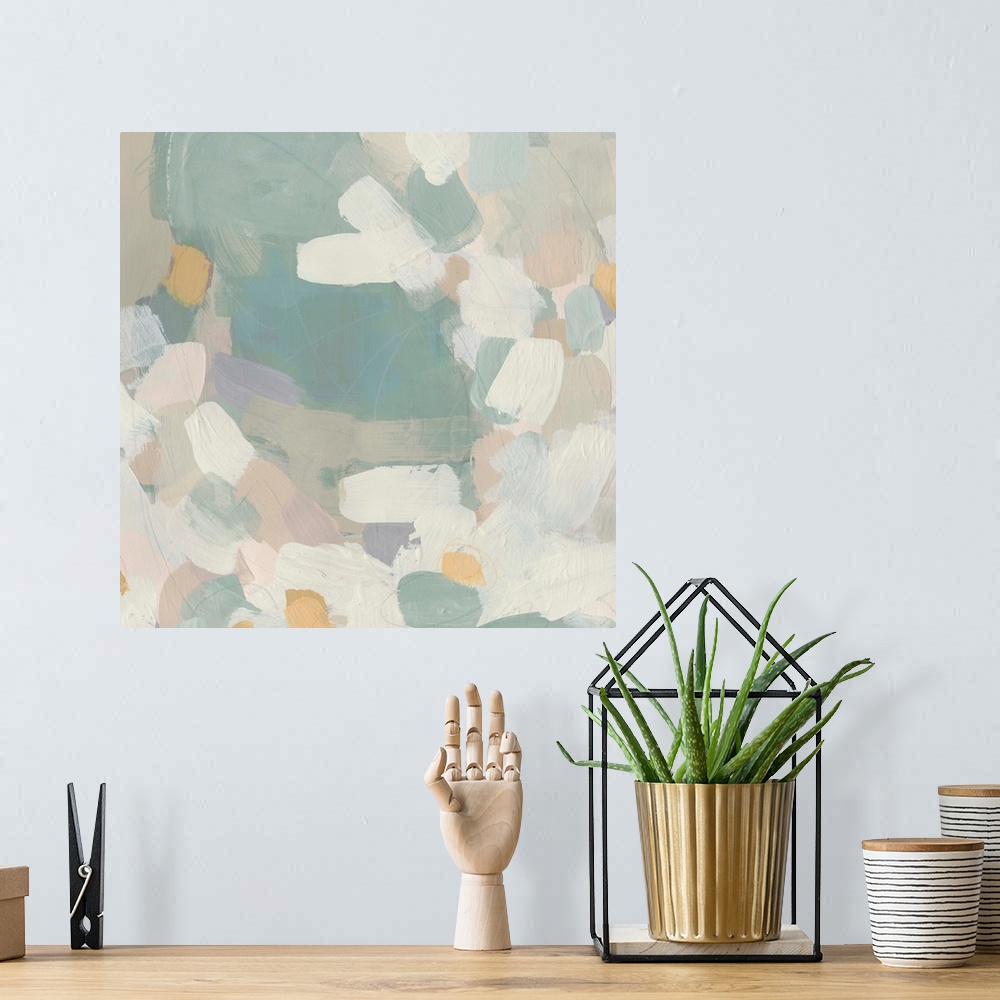 A bohemian room featuring Abstract painting in muted blues and pinks.