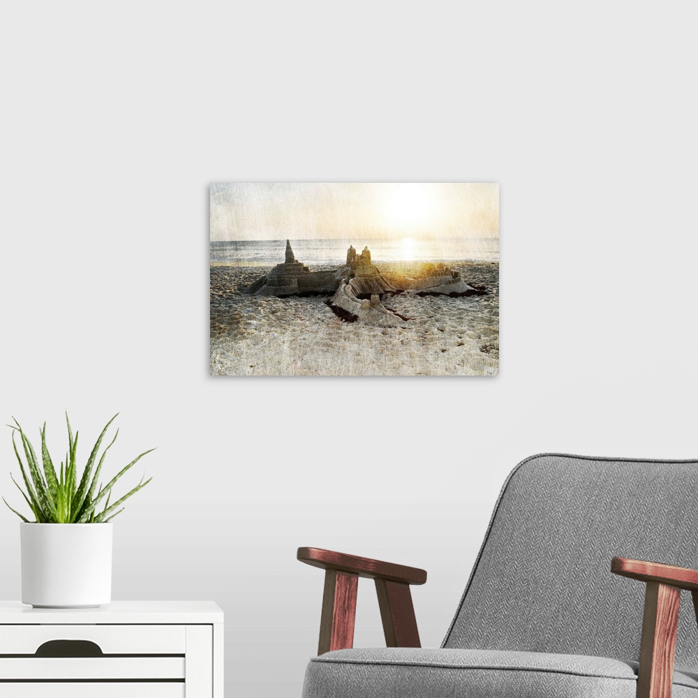 A modern room featuring Photograph of a sand castle on a beach with a rough textured overlay.