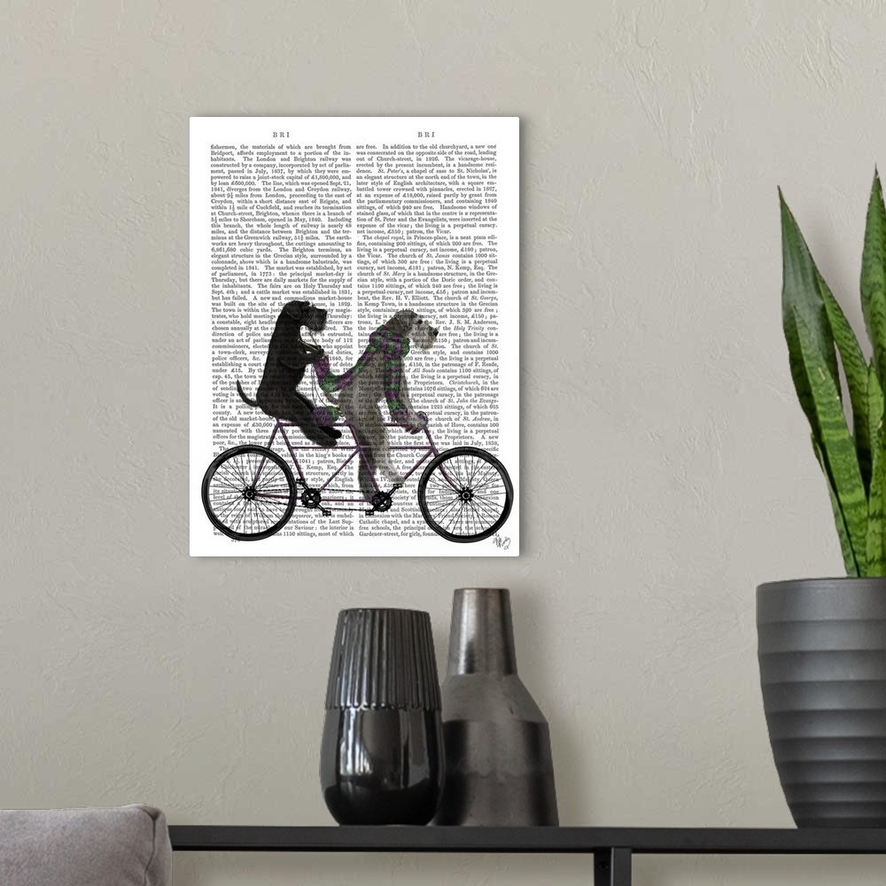 A modern room featuring Decorative artwork of two Schnauzers riding on a tandem bicycle, painted on the page of a book.