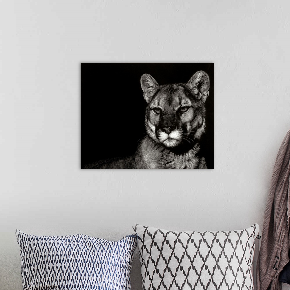 A bohemian room featuring Black and white illustration of a cougar with an intense stare.