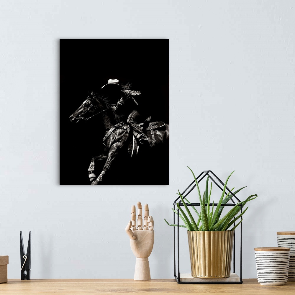 A bohemian room featuring Black and white lifelike illustration of a cowboy riding a horse.