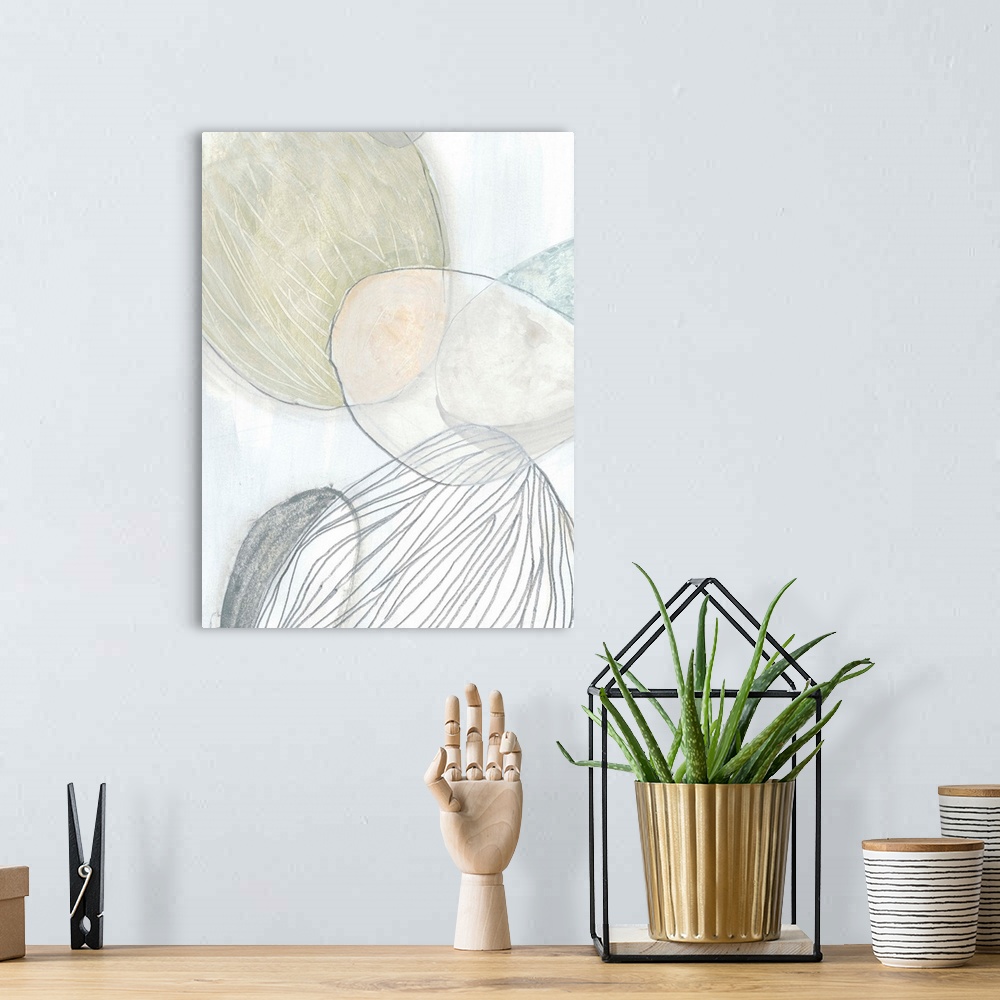 A bohemian room featuring Abstract artwork illustrating the texture of pebbles found at a beach.