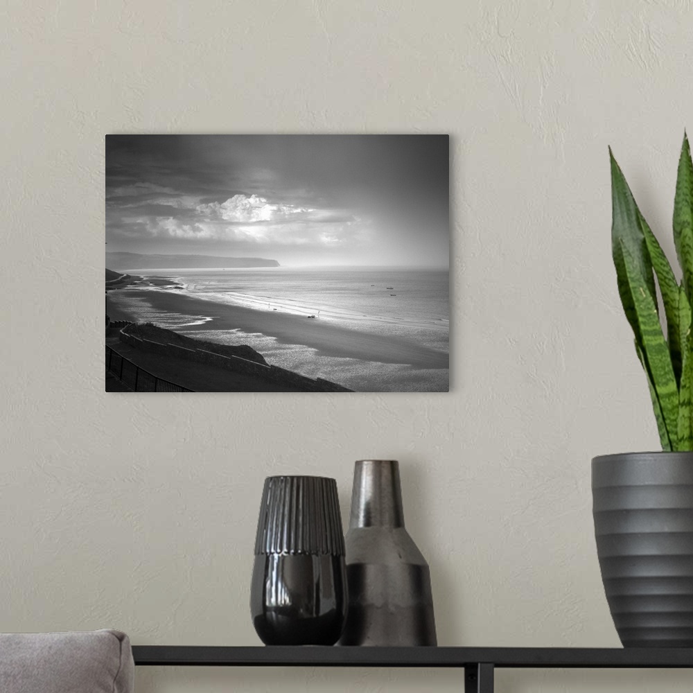 A modern room featuring Fine art photo of a seascape under a stormy sky.