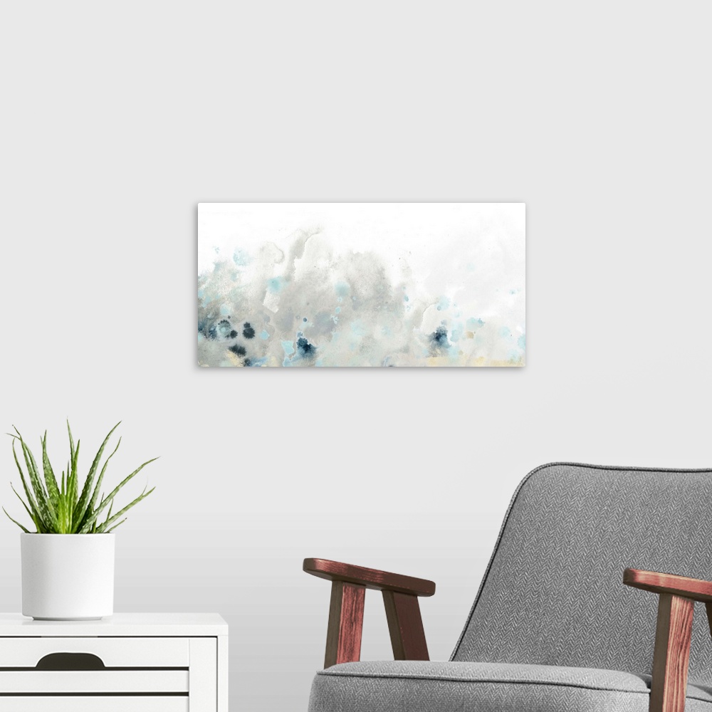 A modern room featuring Abstract artwork in pale grey and navy blue, resembling splashing water.