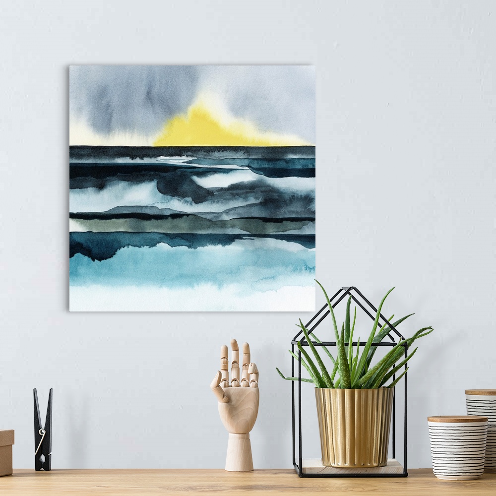 A bohemian room featuring Watercolor art print of a seascape with the bright yellow sun setting on the horizon.