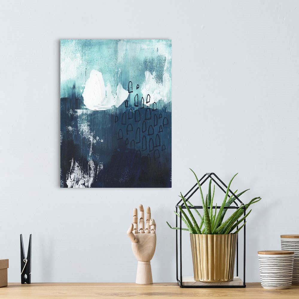 A bohemian room featuring This abstract artwork features window-like shapes over shades of blue with white brush strokes an...
