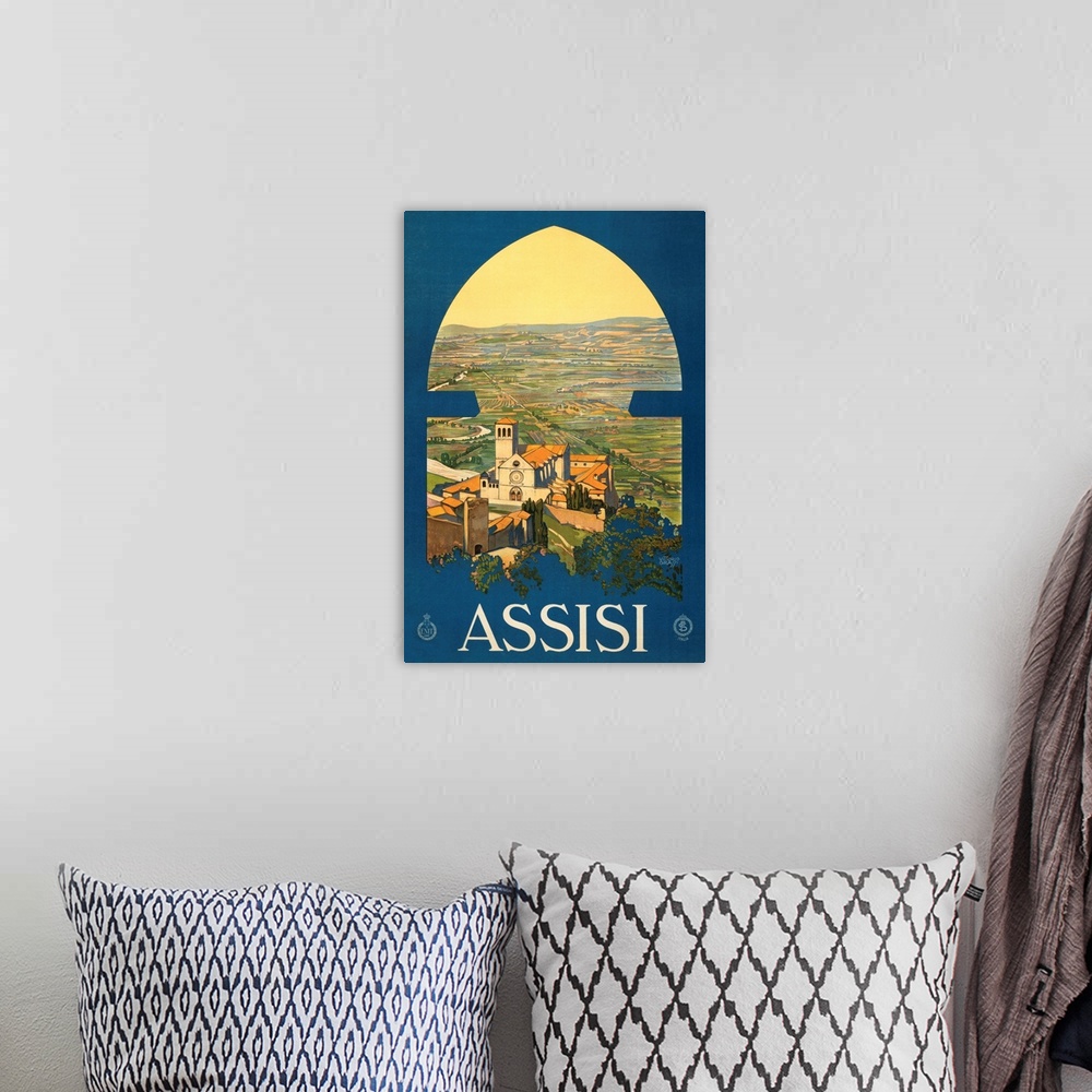 A bohemian room featuring Vintage travel advertisement for Assisi, Italy, with a view of the landscape and historic buildings.