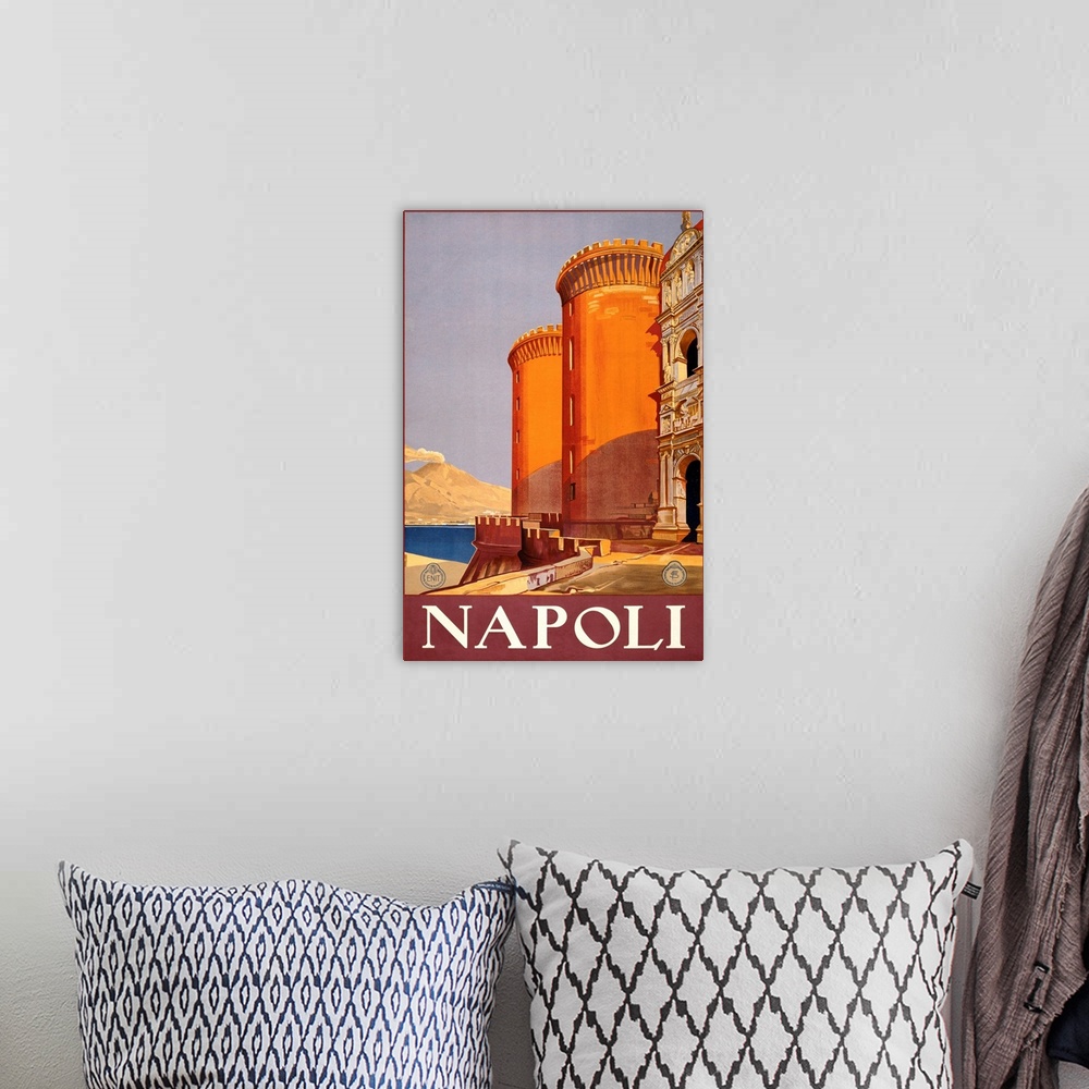 A bohemian room featuring Vintage travel poster for Naples, Italy, showing historic buildings.