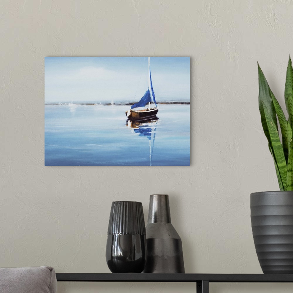 A modern room featuring Contemporary art print of a sail boat on crystal blue water.