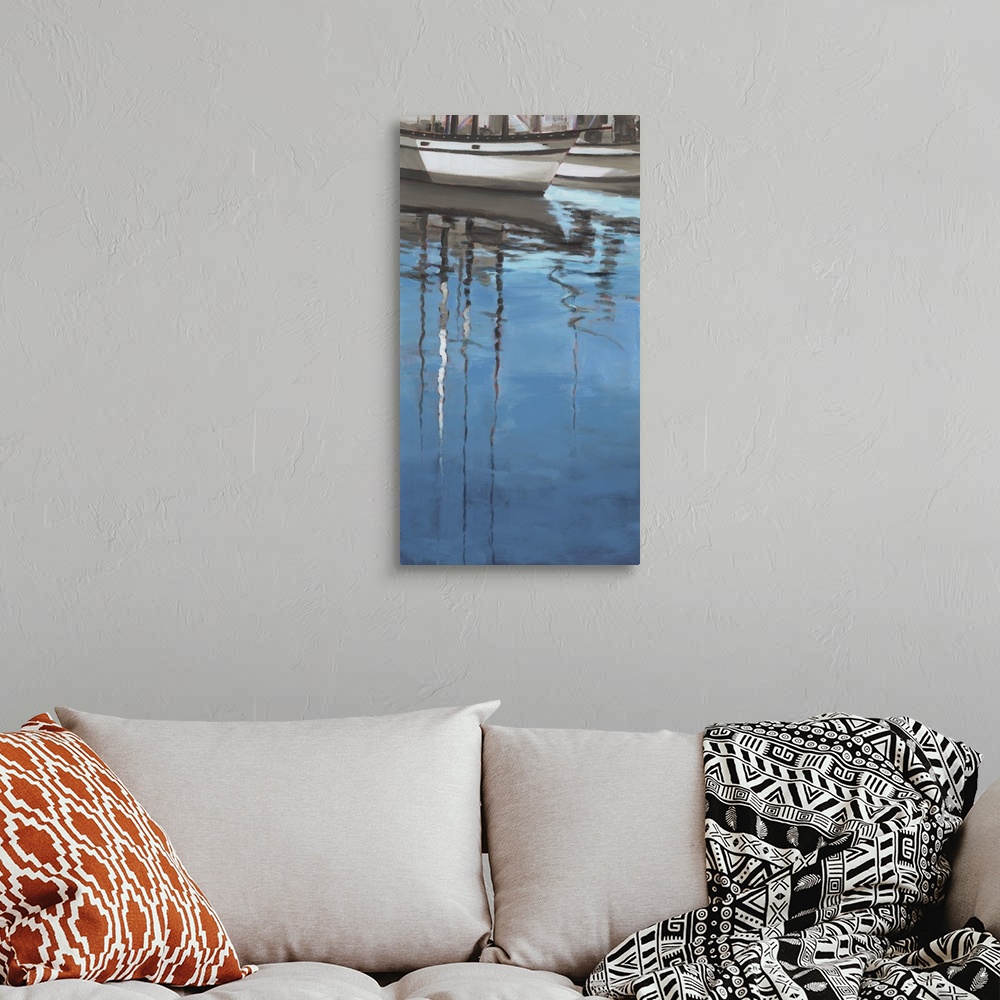 A bohemian room featuring Art print of sail boat reflections in rippling water.