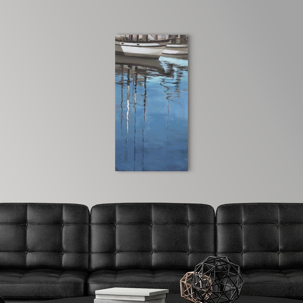 A modern room featuring Art print of sail boat reflections in rippling water.