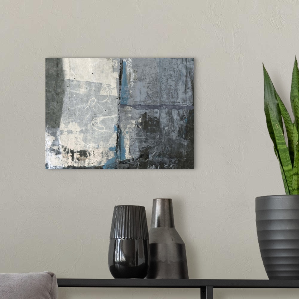 A modern room featuring A contemporary abstract painting using shades of gray and weathered textures.