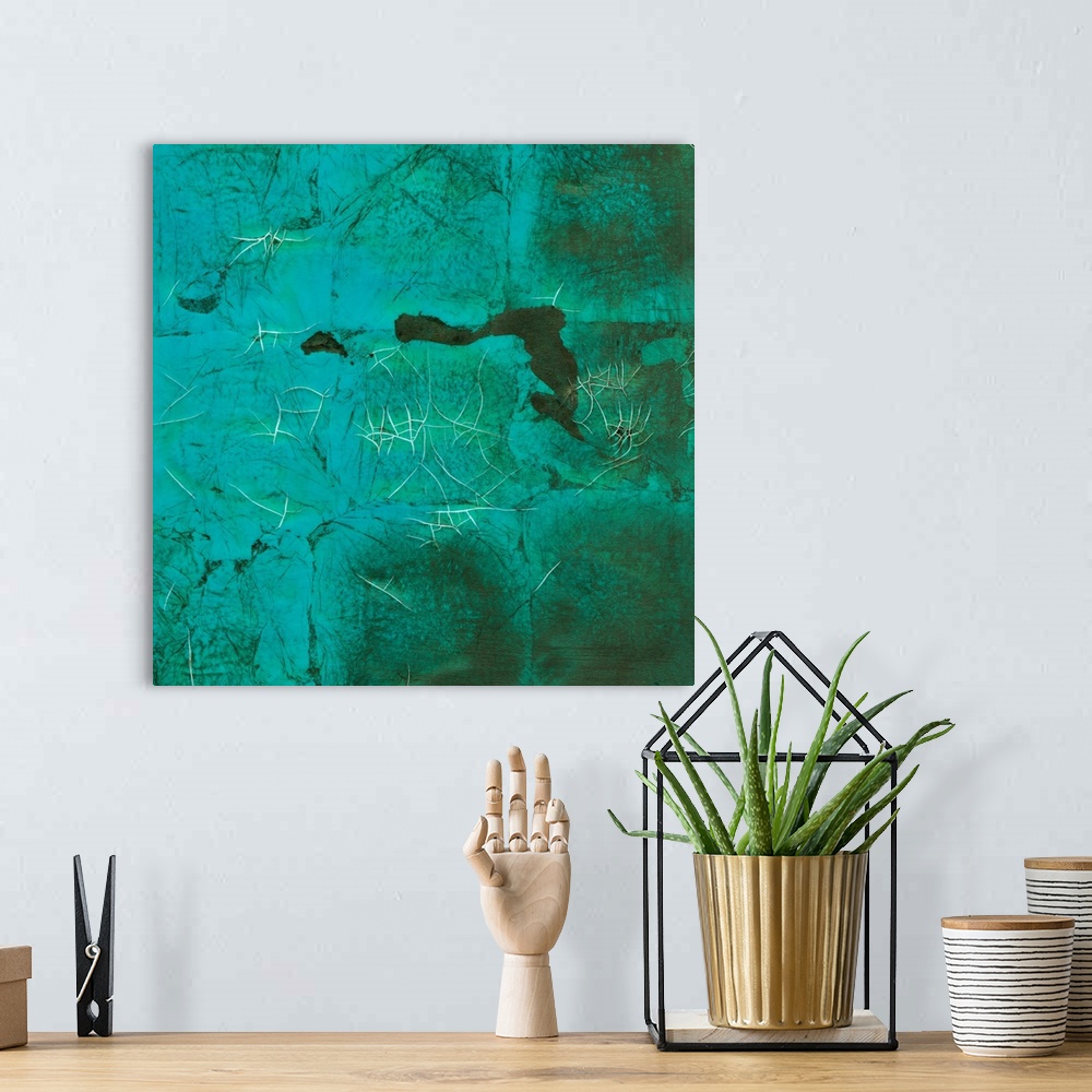 A bohemian room featuring This abstract artwork piece has a distressed background with what appears to be creases in the ma...