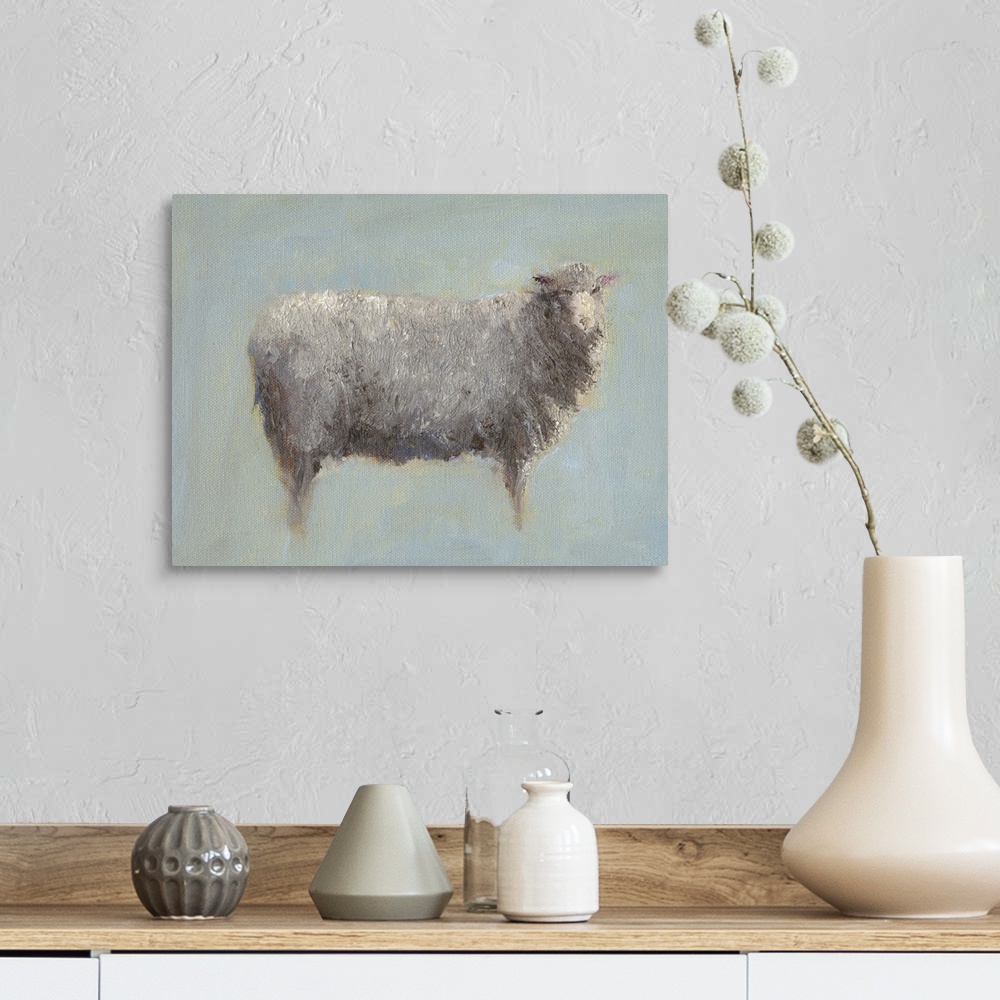 A farmhouse room featuring A horizontal painting of a sheep in muted color tones.