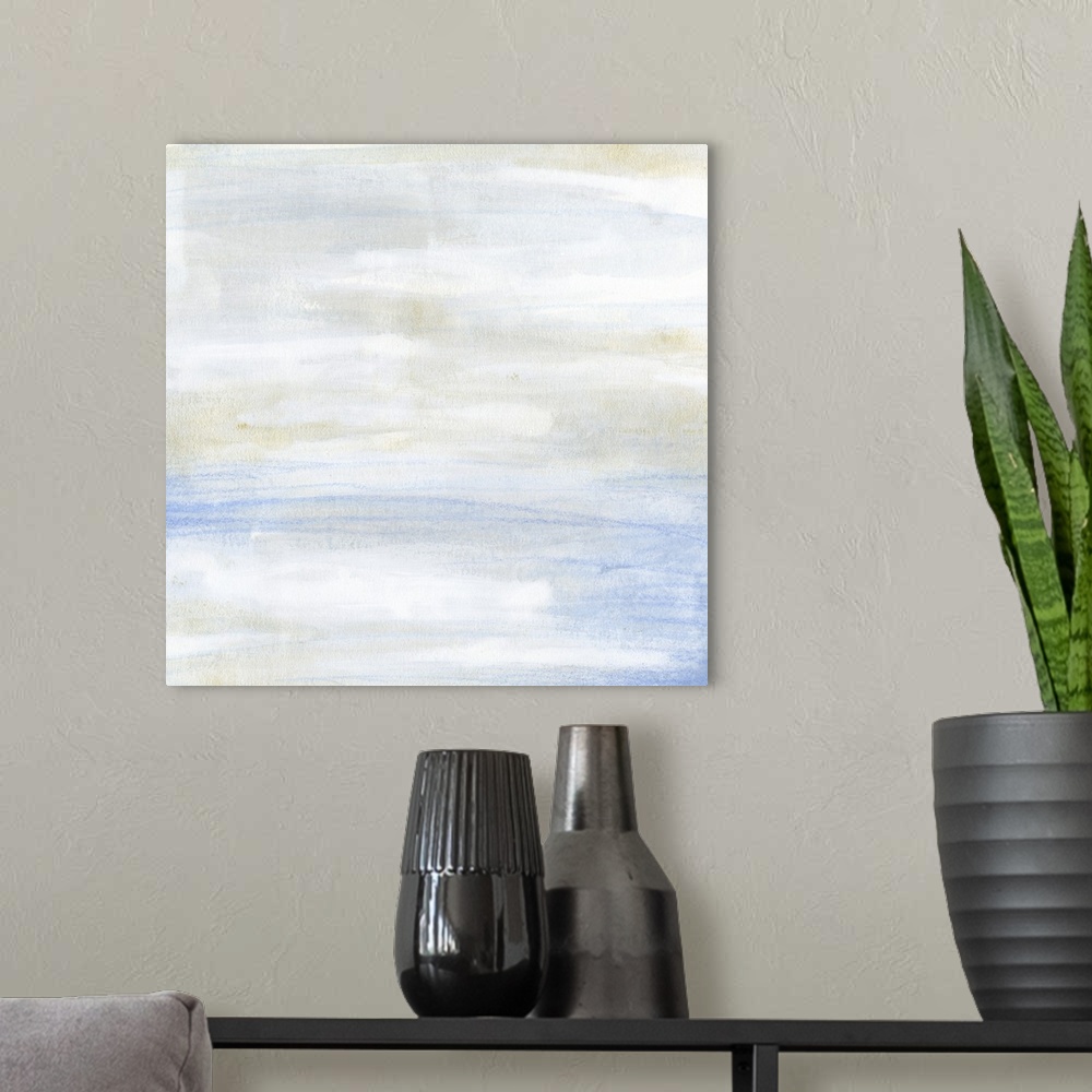 A modern room featuring Square contemporary abstract art in pastel shades of blue and beige, resembling a cloudy sky.