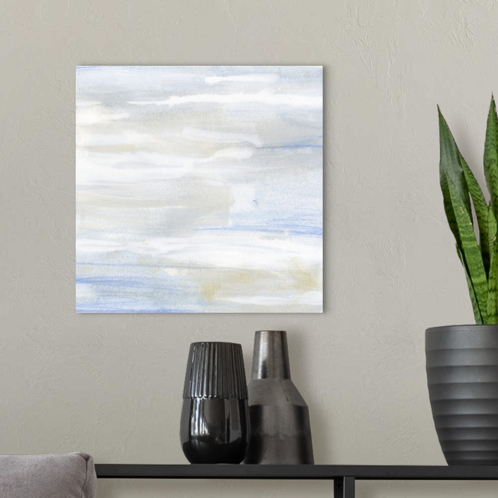 A modern room featuring Square contemporary abstract art in pastel shades of blue and beige, resembling a cloudy sky.