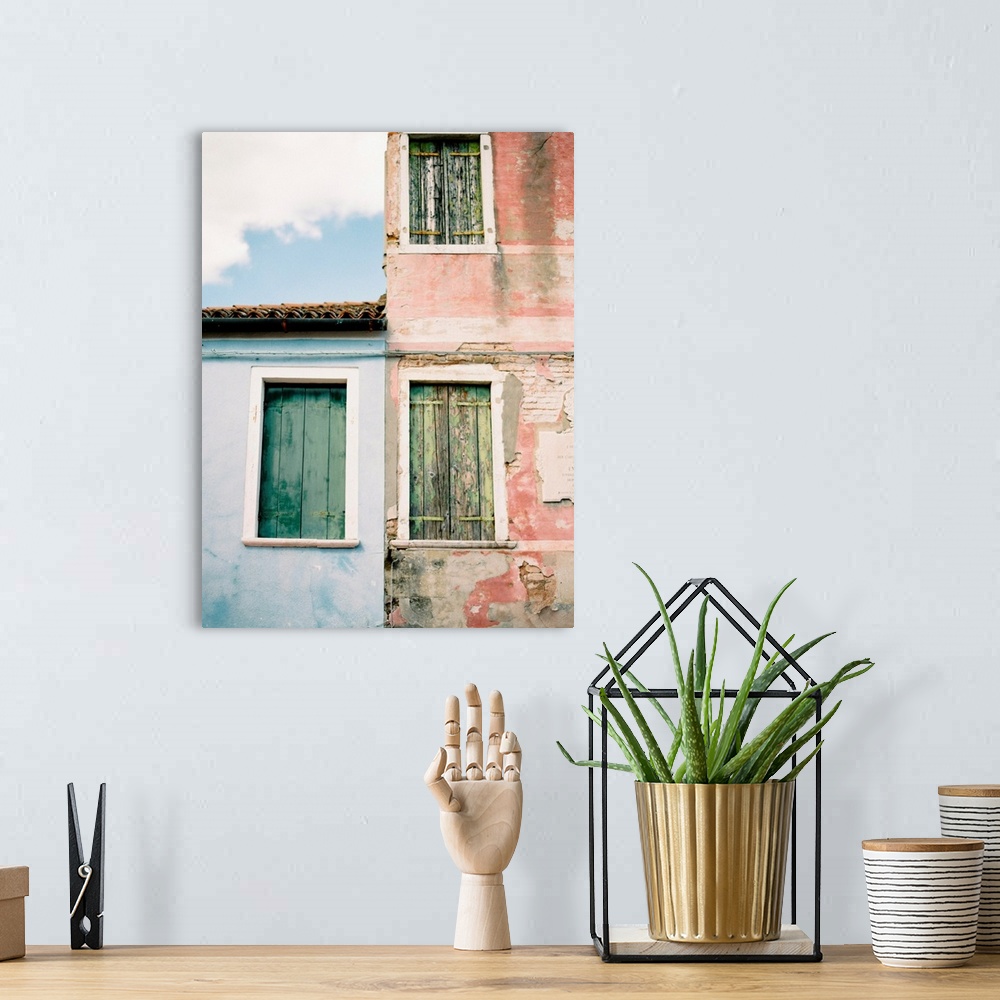 A bohemian room featuring Photograph of old windows with wooden shutters, Burano, Italy.