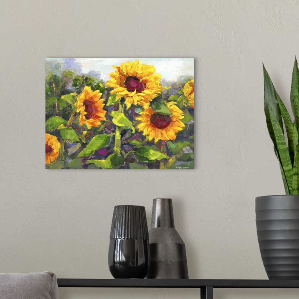 A modern room featuring Contemporary painting of a group of bright sunflowers in bloom.