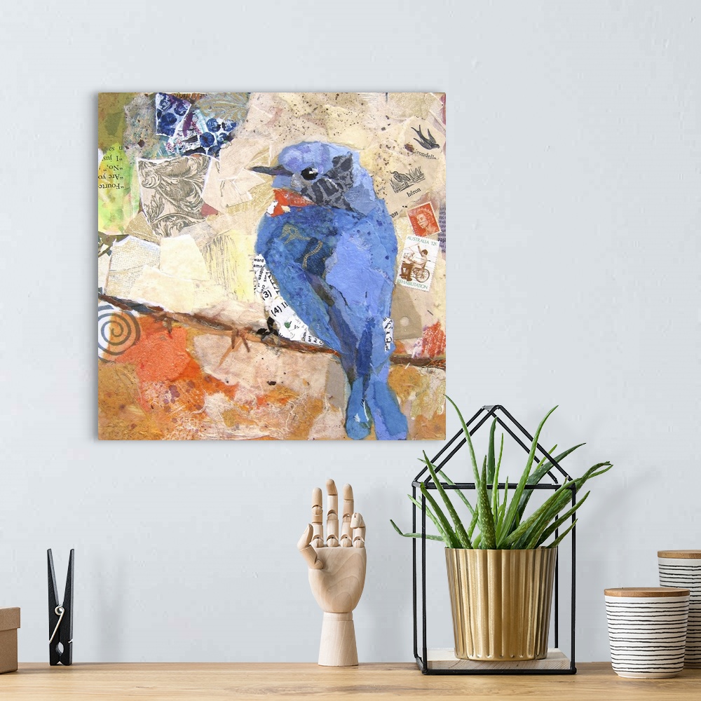 A bohemian room featuring Creative collage of a blue bird perched on a branch with pieces with text and postage stamps.