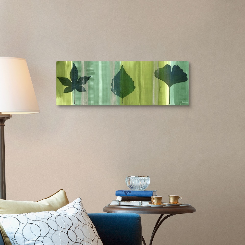 A traditional room featuring Contemporary artwork of an outline of a leaf against a multi-green toned background.