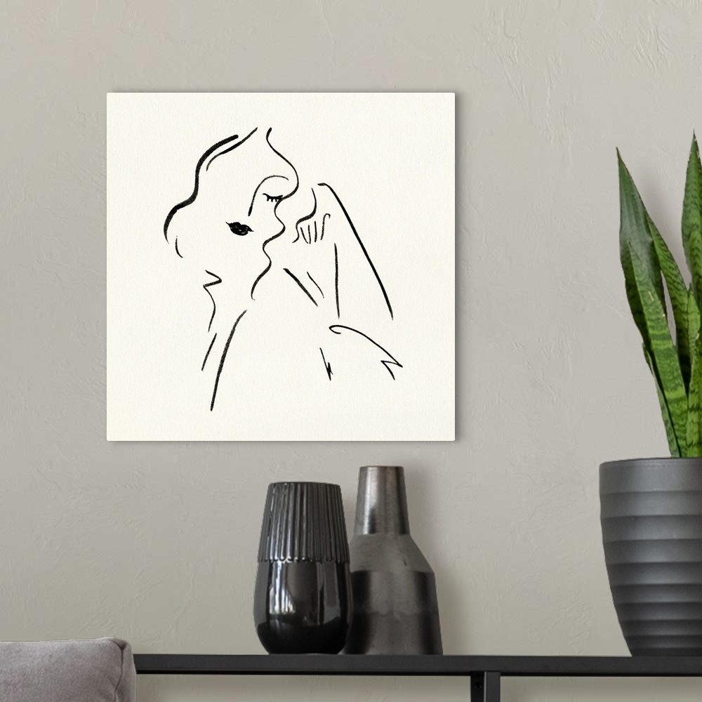 A modern room featuring Contemporary outline of an abstracted female figure.