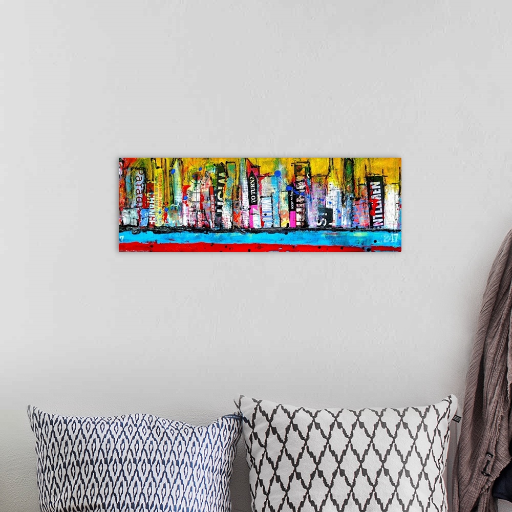 A bohemian room featuring A mixed media collage of paint and printed materials to make a city skyline along a water front i...