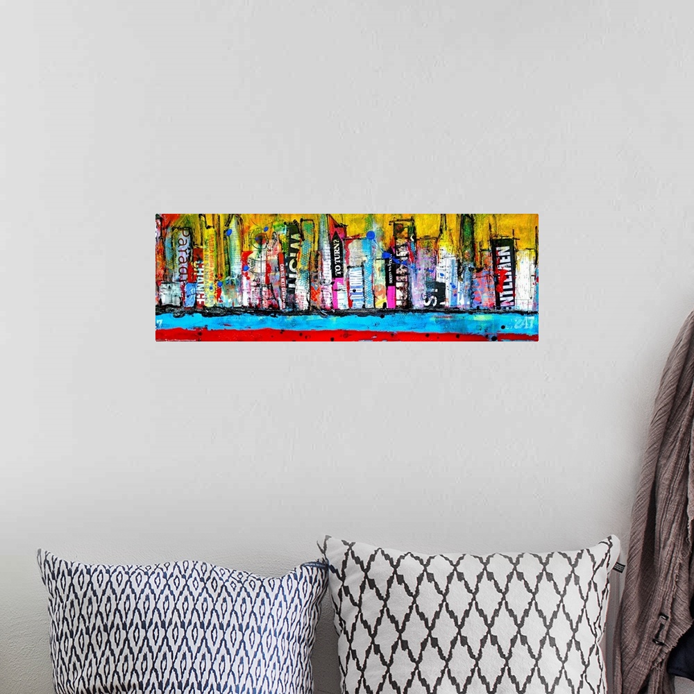 A bohemian room featuring A mixed media collage of paint and printed materials to make a city skyline along a water front i...